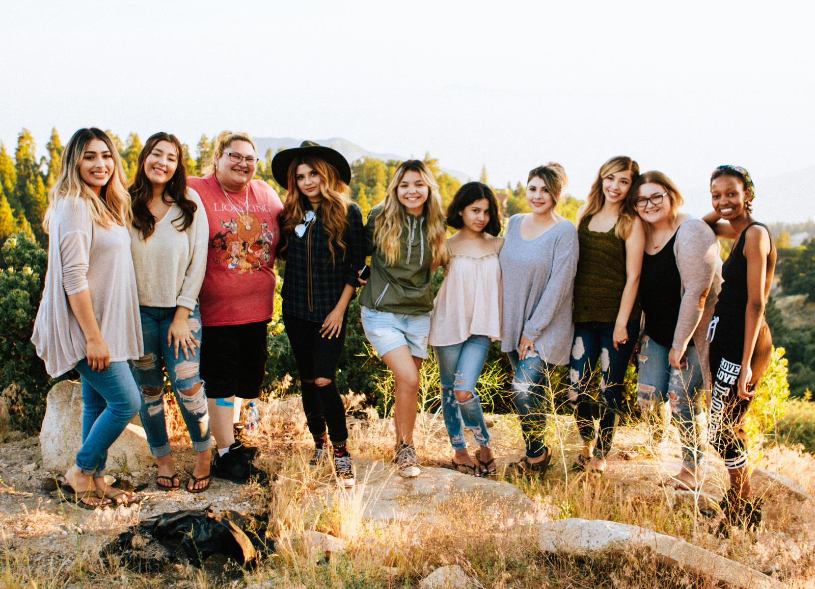 A group of women standing together outdoors